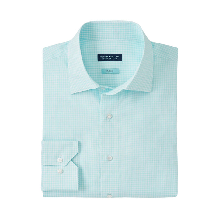 This refined sport shirt is made from a soft cotton twill with our signature Flex Finish—a special treatment that elasticizes natural yarns to provide stretch and enhanced comfort without the use of synthetic fibers. Finished with a spread collar, French placket, mother-of-pearl-buttons and mitered cuffs. Men’s 100% cotton sports shirt. Tailored Fit. Spread collar with mother-of-pearl buttons. Machine wash cold; lay flat to dry or dry clean.