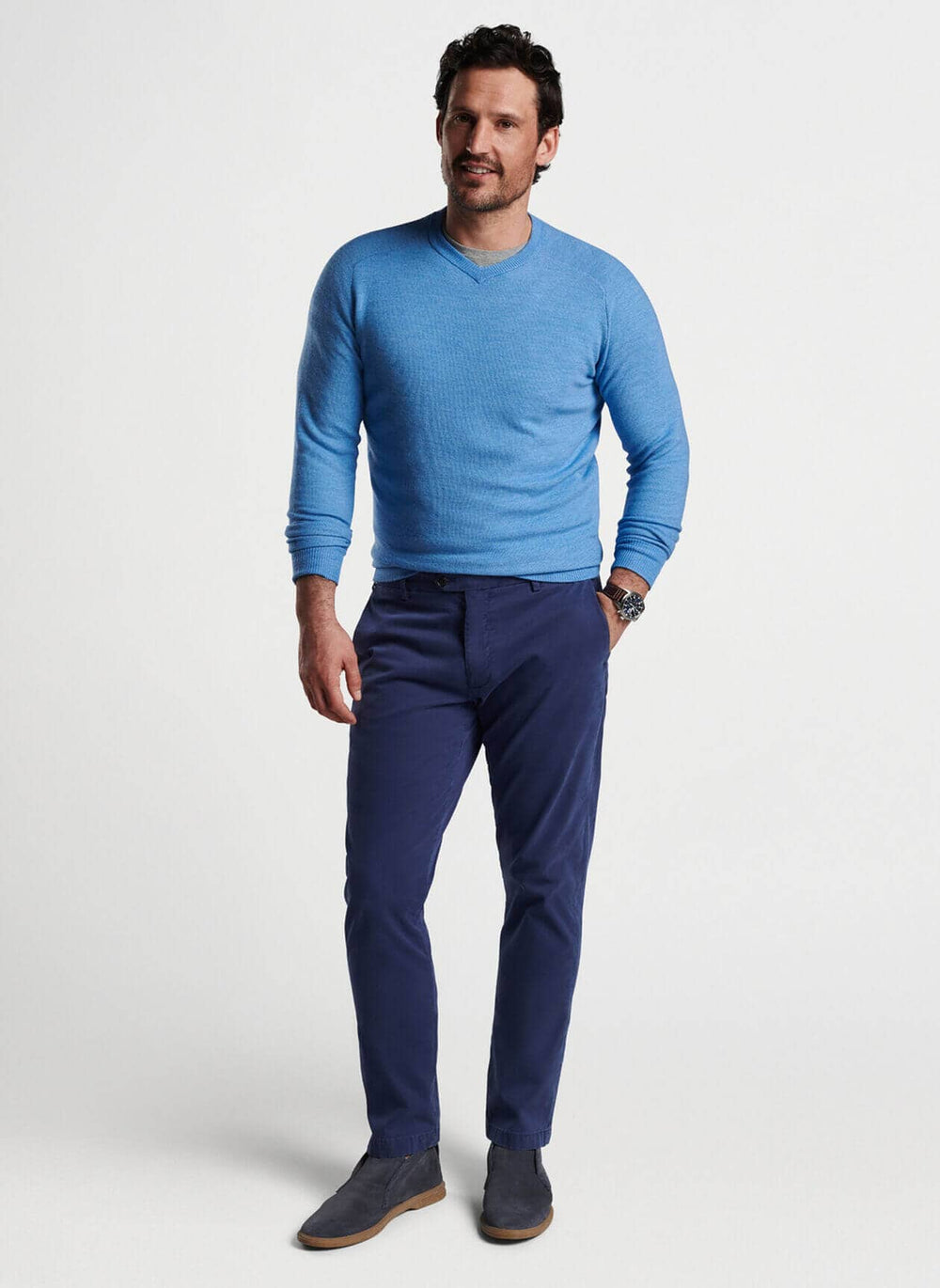 This lightweight sweater is crafted from the softest 17.5 micron Merino wool with an intricate honeycomb stitch. A unique high-V construction sits between a traditional V-neck and crewneck for an updated take on timeless style.