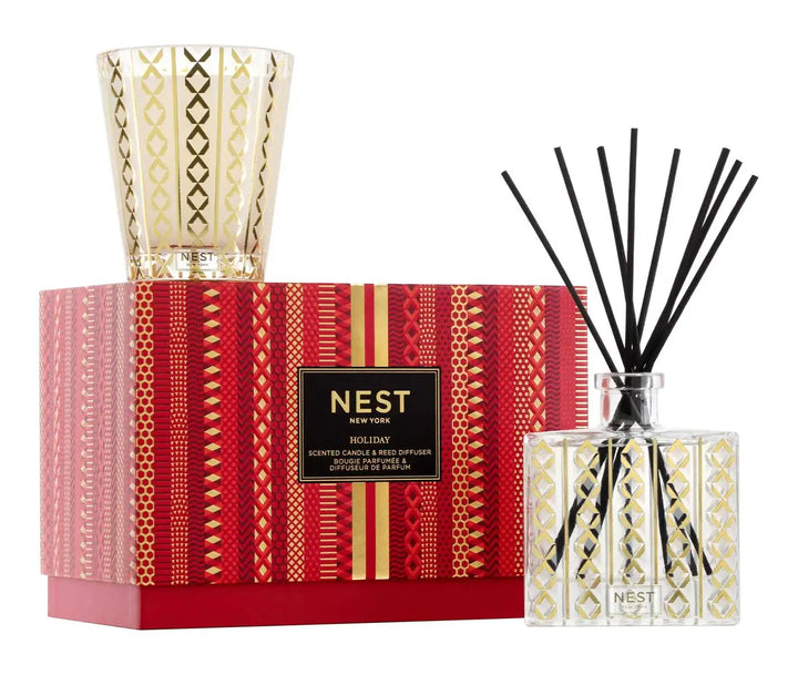 Create the quintessential aroma of the season with this bestselling fragrance, Holiday. This set features the iconic scent’s blend of pomegranate, mandarin orange, pine, cloves, and cinnamon with a hint of vanilla and amber. Each is housed in a glass vessel with a festive, metallic gold design. Classic Candle: 8.1 oz | 230 g; Reed Diffuser: 5.9 fl oz | 175 ml The Classic Candle is meticulously crafted with a proprietary premium wax formulated to burn cleanly and evenly, while the Reed Diffuser is made with 