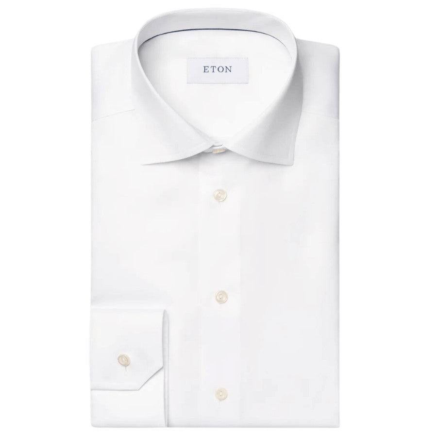 Eton's most iconic shirt offers an impeccable business look and all-day sharpness. Tailored from our wrinkle-free Signature Twill fabric, it ensures flawless draping and luster. Crafted to perfection with exquisite tailoring, it exudes timeless elegance.