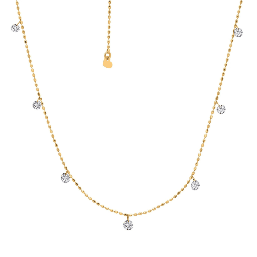 tiny floating diamond necklace yellow gold