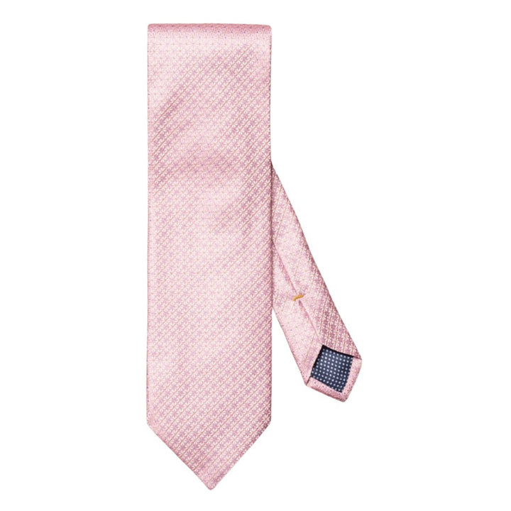 An elegant tie woven from 100% pure silk crafted with a micro floral pattern with a rich texture and impeccable luster. The ideal addition to classic business wear. Made in Italy.