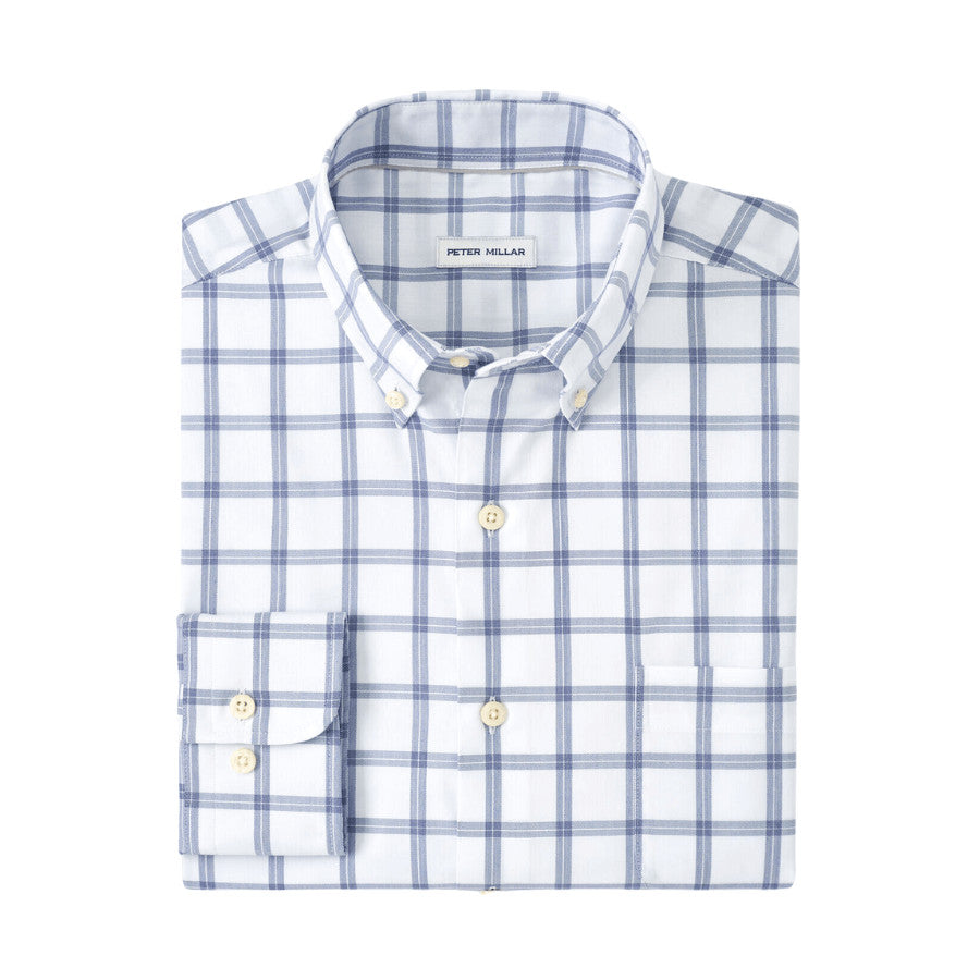 This sport shirt is crafted from a lightweight, ultra-soft cotton-performance twill with stretch, wicking properties, and all-day comfort. It’s completed with a button-down collar, French placket, and double-button barrel cuffs. Men's 42% cotton / 36% nylon / 17% Tencel / 5% spandex sport shirt. Classic Fit. Two-way stretch. Button-down collar, French placket, double-button barrel cuffs. Machine wash cold with like colors; Tumble dry low. Imported.