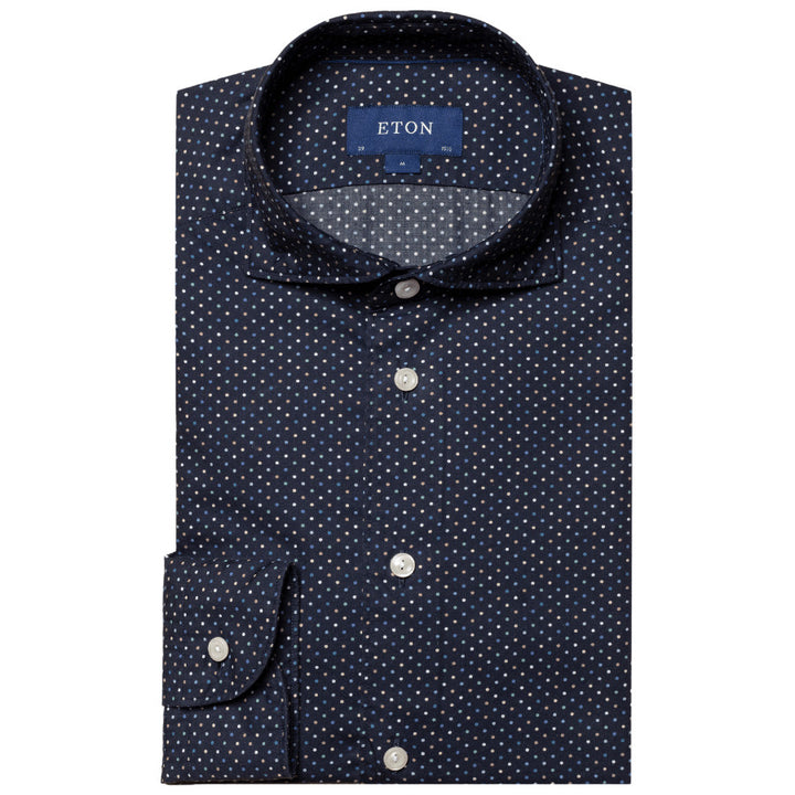 Patterned with Eton's signature dot design, this shirt will make you stand out. Matching possibilities are endless – from a strict business suiting to a laid-back look with your favorite jeans. 100% Cotton. Wrinkle free. 