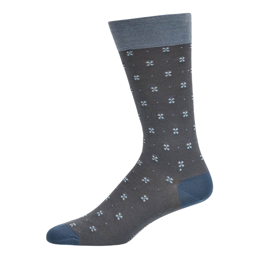 Marcoliani mid-calf socks featuring an intarsia geometric pattern. Ribbed cuff to prevent slipping. Modal/nylon/polyamide/cotton. Machine wash. Made in Italy.