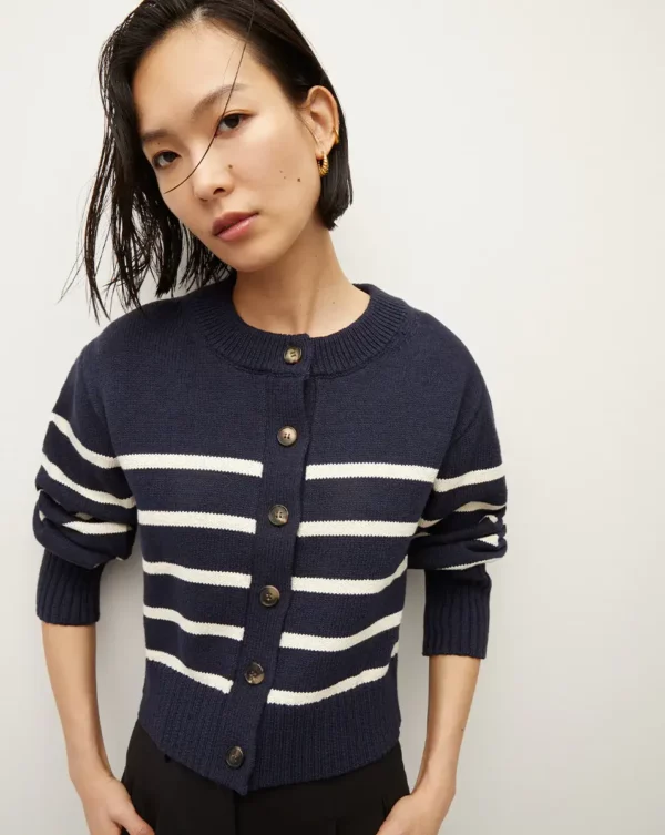 A nautical striped cardigan is forever. Introducing the Kylin, made from 100% cotton, and designed to be an everyday go-to. This timeless piece offers a relaxed, easy fit, and is finished with puffed sleeves, a slightly cropped length, and tortoise buttons. Throw it over your shoulders when temperatures start to drop or wear it alone with jeans and loafers for a classic fall look.