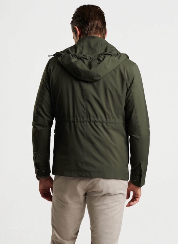 An icon of luxury innovation, our timeless safari jacket is crafted from a specially engineered Italian fabric that’s wind and water-resistant with natural stretch. A wrinkle-resistant, packable design incorporating a wide range of pockets makes it perfect for travel, while a low-profile hood can be rolled into a zippered pouch along the neckline.