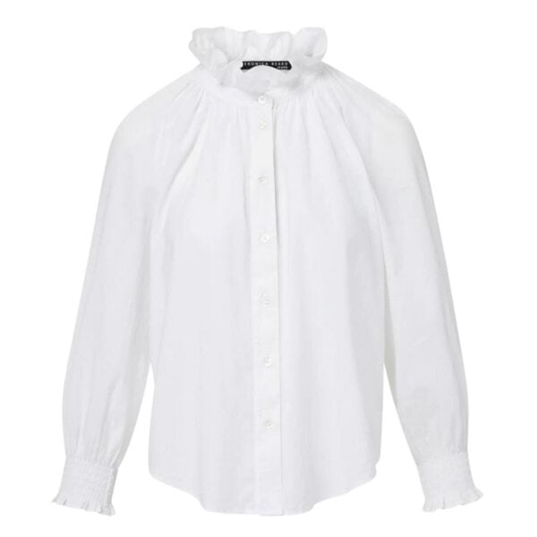 The Calisto is our feminine take on the classic button-down. Expertly tailored from super-soft washed cotton, this relaxed silhouette features a dramatic ruffle collar and smocked cuffs. A curved hem, meanwhile, allows for effortless styling—whether tucked in or out. Wear this on its own or as a layering essential—it’s perfect for work, weekends and wanderlust.