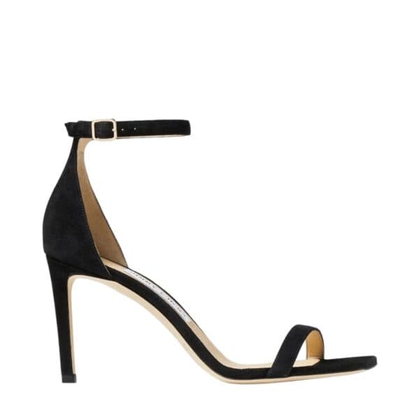 Italian-crafted in black suede, this elegant sandal is an occasion wardrobe must-have. A sharp square toe and a delicate ankle strap complements a sophisticated ensemble.