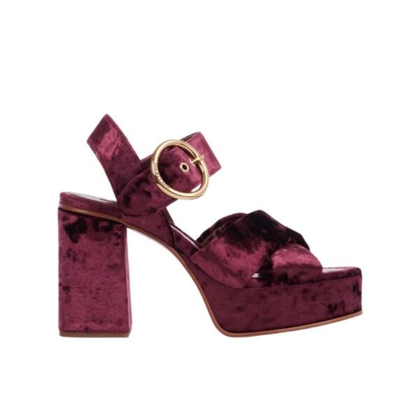 Orla high-heel sandal in sumptuous velvet with a chunky platform silhouette for day-to-evening wear. The adjustable strap features a large round gold-toned buckle engraved with the See By Chloé logo for a signature touch.