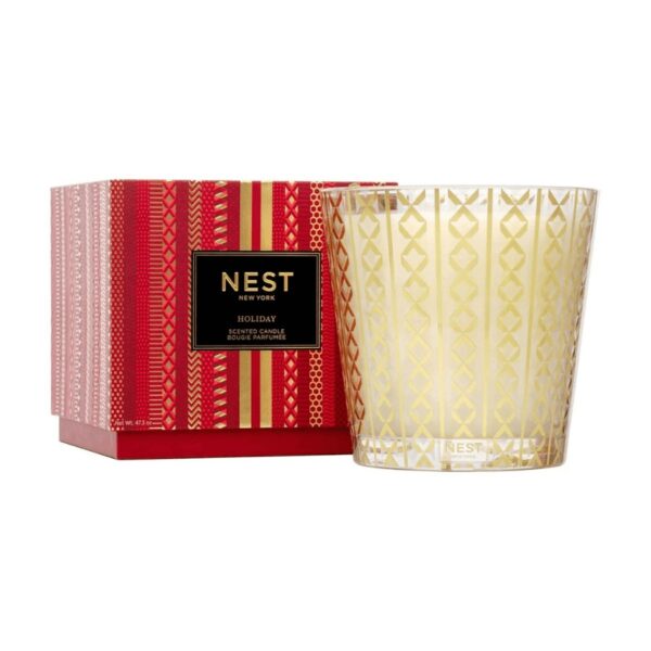 Create the quintessential aroma of the season with this bestselling fragrance, Holiday. This exquisitely fragranced Luxury Candle features the iconic scent’s blend of pomegranate, mandarin orange, pine, cloves, and cinnamon with a hint of vanilla and amber. Housed in a glass vessel with a festive, metallic gold design. Weight: 43.7 oz | 1239 g This exquisitely fragranced candle is meticulously crafted with a proprietary premium wax formulated so the candle burns cleanly and evenly and infuses a room with exceptional scent.
