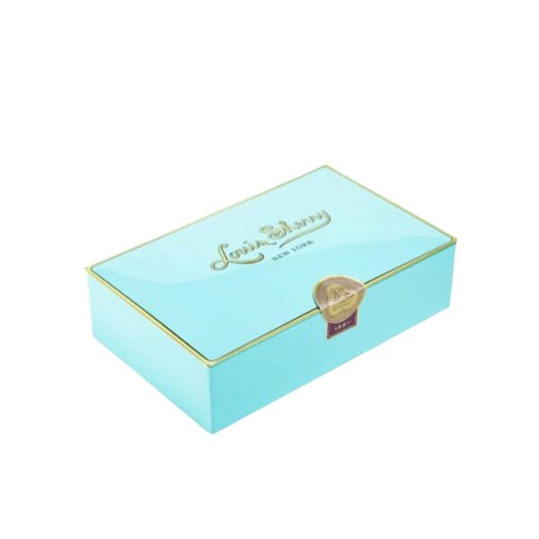 Louis Sherry's emblematic gift box is composed of a house selection of exquisite truffles renown for their creamy texture and exceptional silkiness. A truly delightful gift for anyone to indulge in the pleasure of fine chocolate. Tin: 6.3″L x 4″W x 1.75″T. 12 truffles per tin. Net. wt. 6 ounces. Shelf life: 9 months. Made in the USA of imported materials.