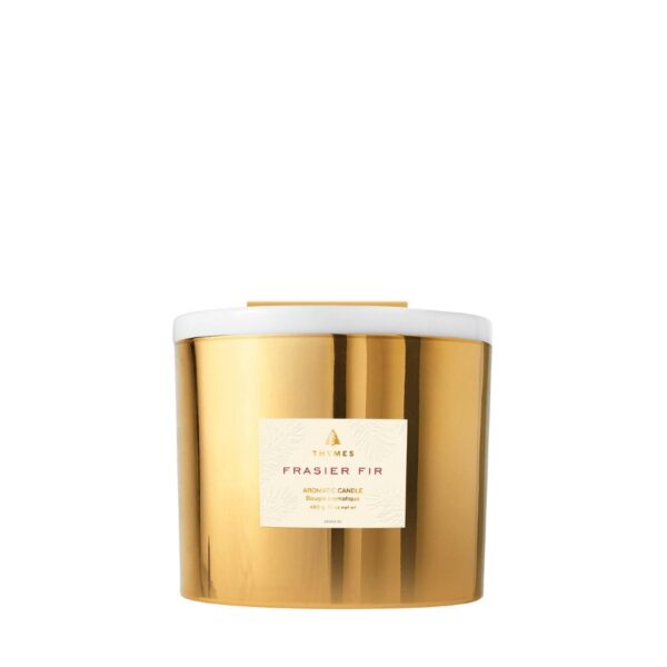 The elegant glow of gold makes this 3-wick statement piece the perfect way to experience the iconic mountain fresh fragrance of Frasier Fir. 17.0 OZ NET WT / 480 G.