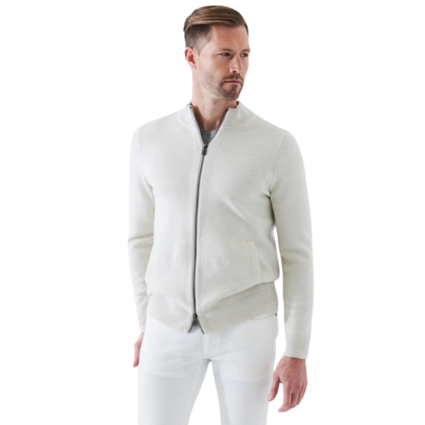 100% merino wool. Zip up. Gentle wash - lay flat to dry. Fits true to size. Designed for a regular fit. Mid-weight knit.