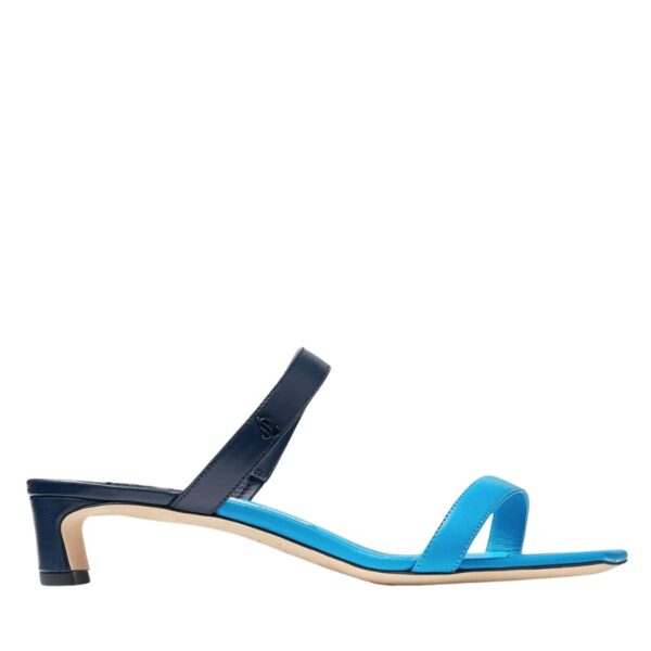 Jimmy Choo's Kyda sandals are crafted in a patchwork Nappa leather. They're an ultra-wearable modern style that features two contrasting straps with square toe. This wear-with-anything style is an ideal fit in your daily capsule, and versatile for both day and evening looks. Color: Blue.