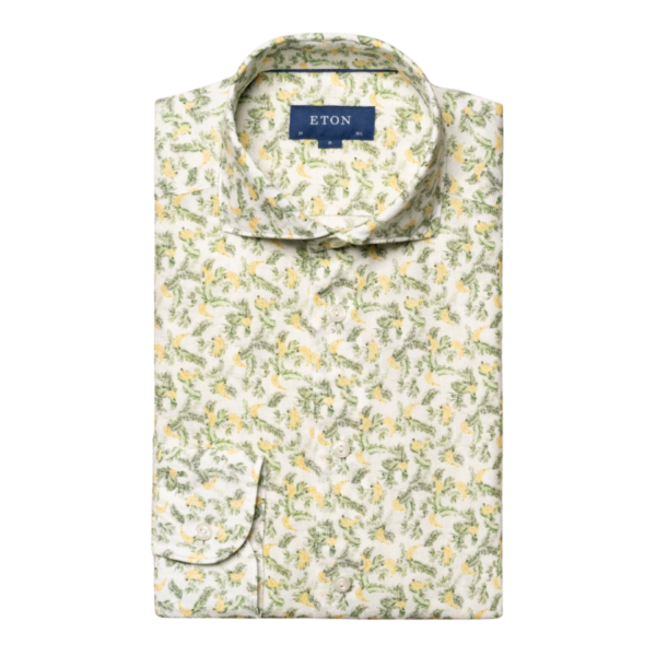 An elegant casual shirt with a banana print cut from a rich and lustrous 100% linen twill fabric with a beautiful structure. This lightweight and breathable piece is garment-washed for extra softness and comfort. 100% linen. Banana print. Woven in Italy. Standard buttons.
