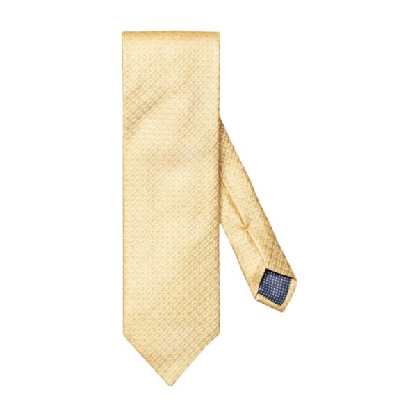 An elegant tie woven from 100% pure silk crafted with a micro floral pattern with a rich texture and impeccable luster. The ideal addition to classic business wear. Made in Italy.