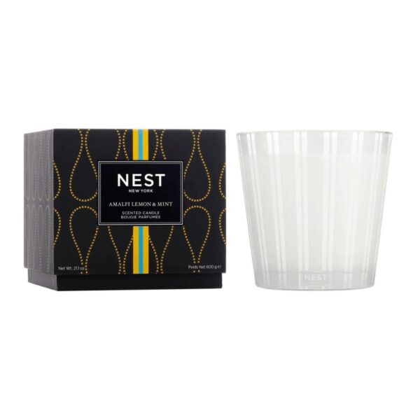 Evoke the essence of Italy’s Amalfi Coast with this 3-Wick Candle featuring zesty lemon and orange bergamot blended with fresh mint and a hint of driftwood. Housed in a glass vessel etched with elegant, frosted stripes to complement any decor. 21.2 oz | 600 g. This exquisitely fragranced candle is meticulously crafted with a proprietary premium wax formulated so the candle burns cleanly and evenly and infuses a room with exceptional scent.