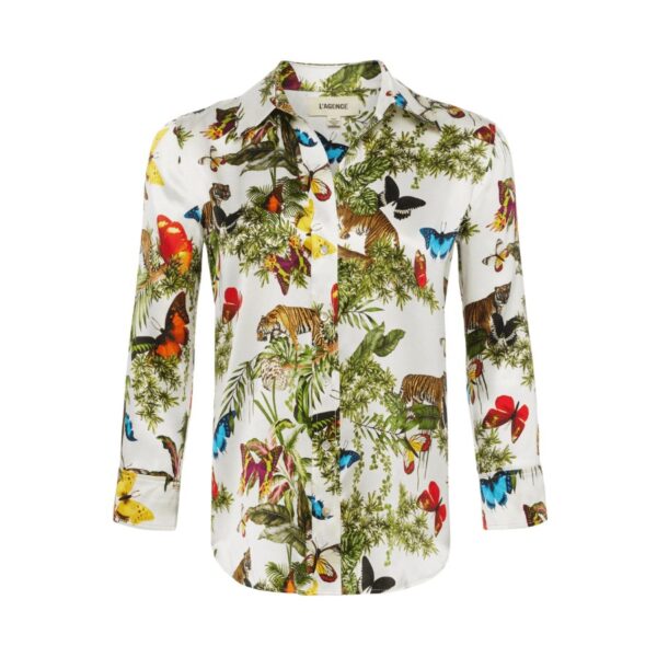 She’s a true L’AGENCE icon and their all-time bestseller. The Dani blouse is the quintessential silk button-down that belongs in every wardrobe. A high-low shirttail hem and three-quarter sleeves create a timeless appeal. Reimagined each season in fresh colorways and prints, there’s a Dani for every occasion. Add to a cropped pant or jean for a chic daytime look. 100% Silk. About 26" From Shoulder to Hem. Sleeve Length: 18.5".