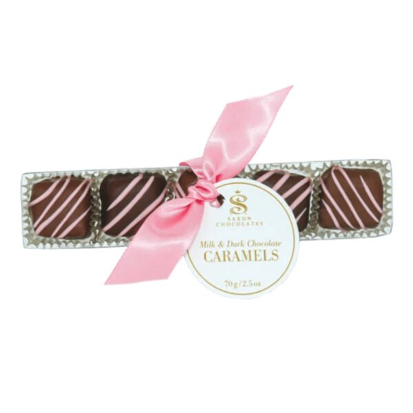 Indulge in our Artisanal Milk and Dark Chocolate Fleur de Sel Caramel's with a pink drizzle. Each acetate box includes 5 pieces with a pink satin ribbon and round tag.  70g / 2.5oz. 12 per case. Shelf life - 12 months.