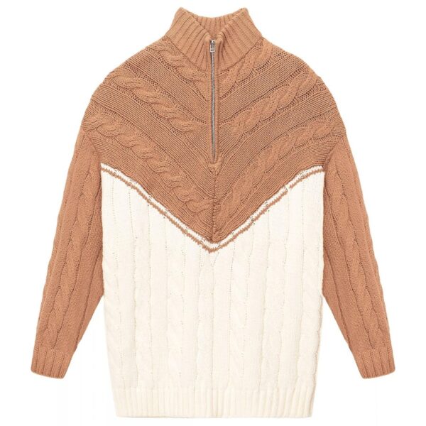 The chunky cotton knit Hampton Sweater is an oversized boyfriend-style sweater in a stripe pattern. This style features a half-zip detail at the front. 60% Cotton, 40% Acrylic. Dry Clean Only. Stand collar. Drop shoulders. Long sleeves. Quarter-zip front. Pullover style. Silvertone hardware. Imported. Check us out on TikTok and Instagram for the latest arrivals, style tips from our expert advisors, and more!