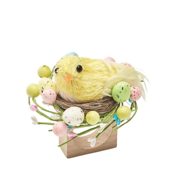 The festive Easter Basket Napkin Ring features an adorable chick perched atop its nest. This imaginative napkin ring includes tiny details such as yellow plumes, a sisal nest, grass pieces, and colorful easter eggs. 3.5" x 3.5" W x 3.75" H.