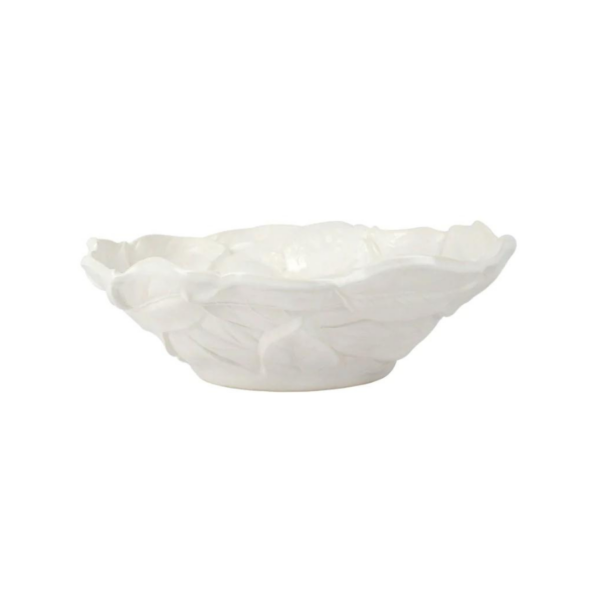 Inspired by the bountiful, robust lemons that flourish in the sunshine along the Amalfi Coast, the Limoni collection is cheerful and iconically Italian. The Limoni White Figural Medium Serving Bowl features intricate, handsculpted lemons and is a uniquely charming serving piece. Dimensions: 11.75"D, 3.75"H. Dishwasher safe.  Microwave safe. 