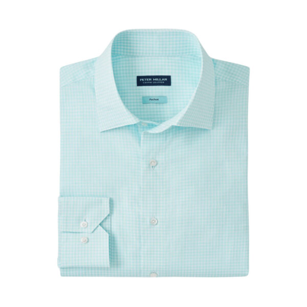 This refined sport shirt is made from a soft cotton twill with our signature Flex Finish—a special treatment that elasticizes natural yarns to provide stretch and enhanced comfort without the use of synthetic fibers. Finished with a spread collar, French placket, mother-of-pearl-buttons and mitered cuffs. Men’s 100% cotton sports shirt. Tailored Fit. Spread collar with mother-of-pearl buttons. Machine wash cold; lay flat to dry or dry clean.