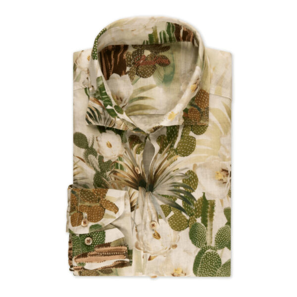 This floral shirt is made of linen and is detailed with mother of pearl buttons, single cuffs and a cut away collar. Moderate cut away collar, No.72. Single Cuff. Printed pattern. 100% Linen. Mother of Pearl Buttons.