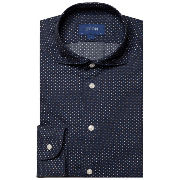 Patterned with Eton's signature dot design, this shirt will make you stand out. Matching possibilities are endless – from a strict business suiting to a laid-back look with your favorite jeans. 100% Cotton. Wrinkle free. 